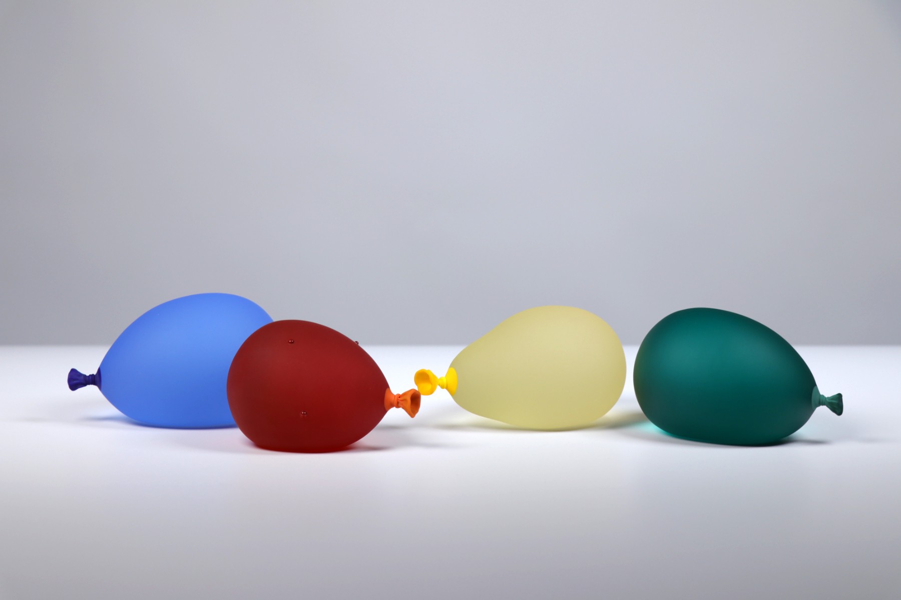Dylan Martinez - Water Balloon Group 2 - Cool Breeze, Sunset Orange w/ droplets, Yellow, Forest Green, 2026, Glass Sculptu...