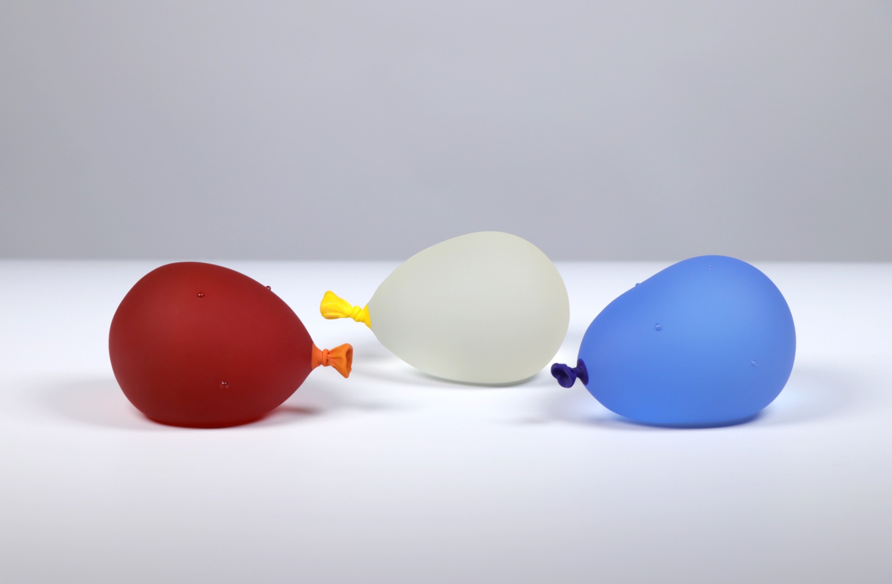 Dylan Martinez - Water Balloon Trio 3- Sunset Orange w/ droplets, Lemonade, Cool Breeze w/ droplets, 2026, Glass Sculpture...