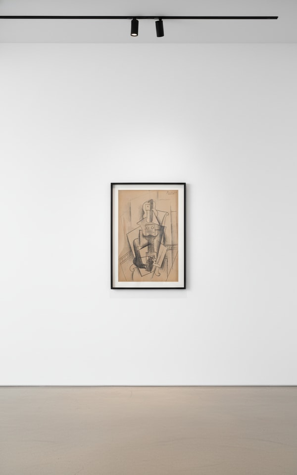 Pablo Picasso - Femme tenant un journal, 1915