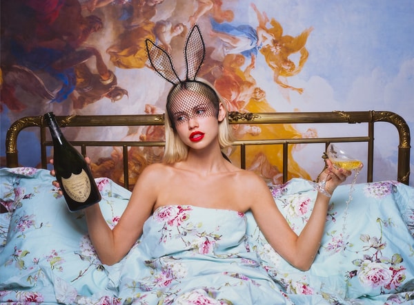 Tyler Shields - The Bunny in the Bed with Champagne, 2023